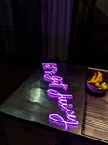 The Original Let's Get Juicy Neon Sign. Outstanding art made by our technician and sign was crafted with 8mm thick led full thickness tubing and cut around acrylic backing. Sign was made in Aurora Purple Color.